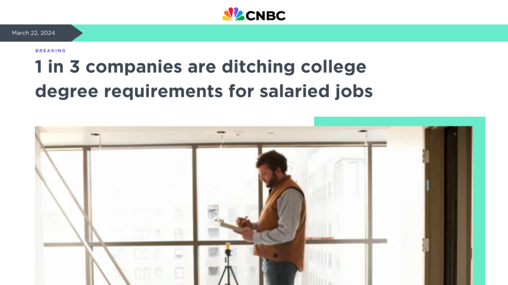 A man standing in an office next to a window, with a cnbc headline discussing companies removing college degree requirements for salaried positions.