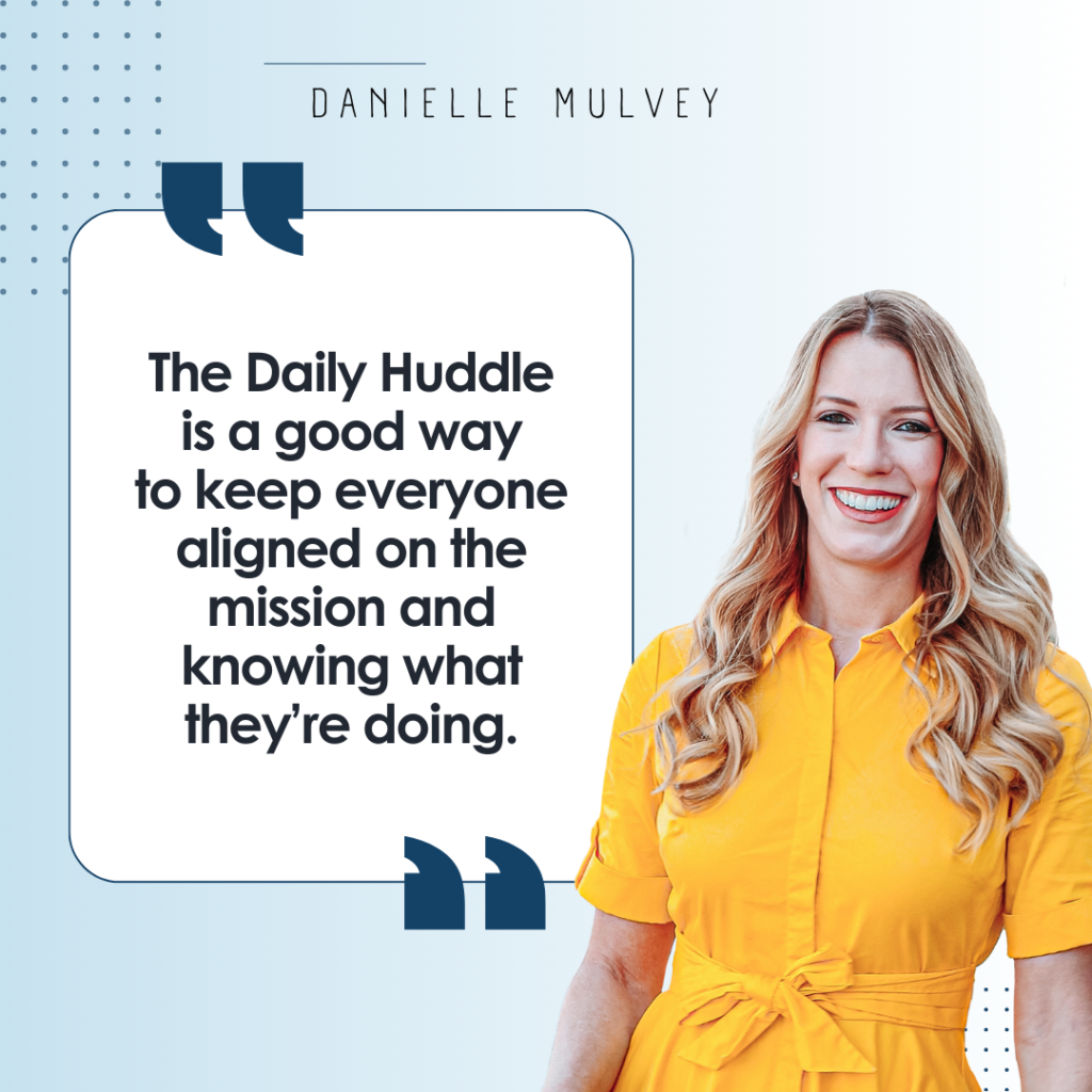 A smiling woman in a yellow dress with a quote about the importance of daily huddles for team alignment and mission clarity, attributed to danielle mulvey.
