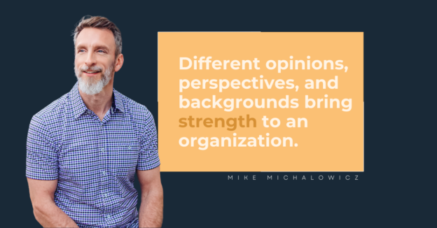 Middle-aged man with a beard smiling, standing next to a quote about diversity in organizations by mike michalowicz on a yellow background.