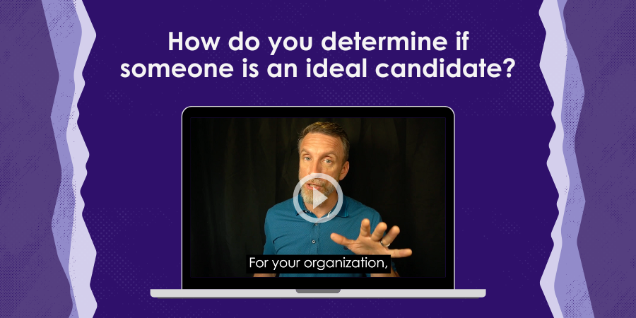A man in a blue shirt speaks in a video on a laptop screen with the text, "How do you determine if someone is an ideal candidate?" displayed above. Subtitles read, "For your organization,".