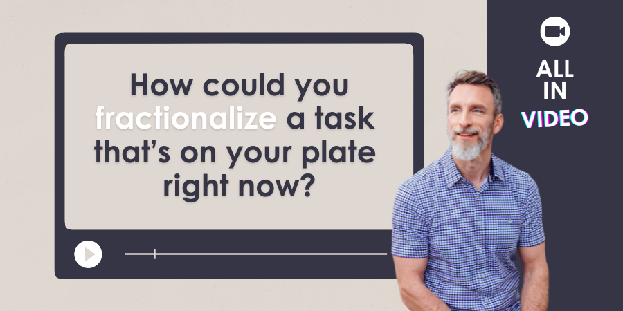 A man in a checkered shirt sits beside a large screen displaying the text, "How could you fractionalize a task that’s on your plate right now?" with a video play button icon nearby.